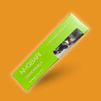 Small green box of Nugbari Churchkhela with double walnuts, traditional Georgian sweet made with natural grape juice and nuts, healthy energy snack.